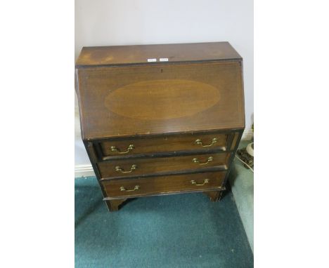A GEORGIAN STYLE MAHOGANY AND MARQUETRY INLAID BUREAU the rectangular top above a fall front opening to reveal an arrangement