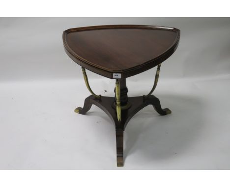 A 19th CENTURY MAHOGANY OCCASIONAL TABLE the shaped top with raised rim raised on a central pod with tripod platform base fit