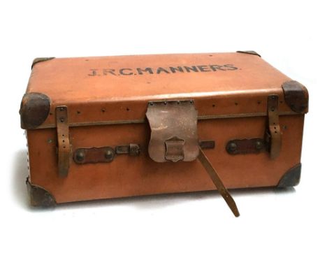 A vintage leather travel trunk, with British Railways travel stickers, with studs and leather bracing, bears label for J.R. B