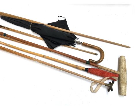 A gent's black umbrella, together with an Elite shooting stick, and polo stick handle converted as a wading stick; and other 
