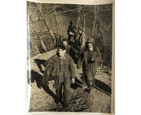 A collection of 21 WWII intelligence photographs, to include 'Advance to Ortona, December 1943'; 'Crossing the Garigliono'; '