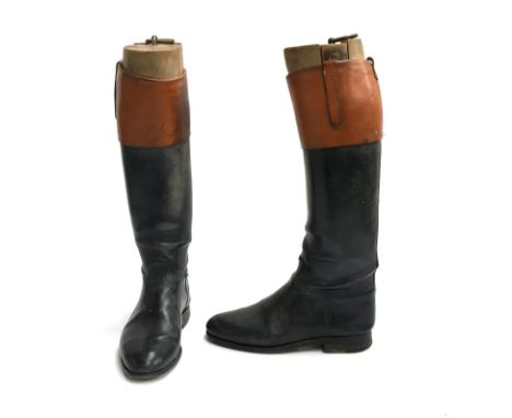A pair of black leather hunting boots with mahogany tops, with wooden trees, approx. size 9.5 