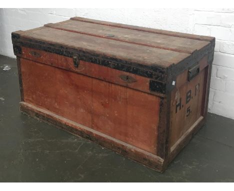 A metal lined travel wood and canvas travel trunk with metal bracings, bears label 'The Marshall Improved Air &amp; Water-tig