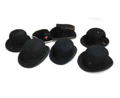 Five black gent's bowlers, to include Army &amp; Navy and Harrods, two top hats suitable for the Marx Brothers, and one other