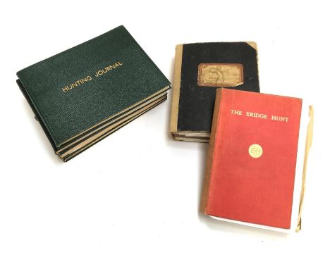 A collection of four hunting journals, relating to the Eridge Hunt in the 1970s, with some photos, hound lists, and other mem