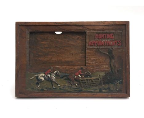 A wood carved and painted hunting appointments card holder, signed SJT lower right, and retailed by Swaine &amp; Adeney Ltd, 
