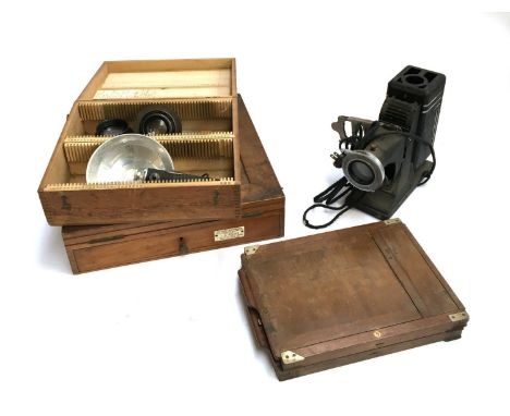 Two early lenses: Taylor-Hobson Anastigmat 6 inch f4.5; Anastigmat 8 inch f5.6; together with 'The "Bruce" Retouching Desk' m