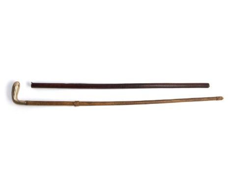 A riding stick, with whalebone shaft, covered in lizard skin, with a .800 silver knop, 72cmL; together with a leather riding 