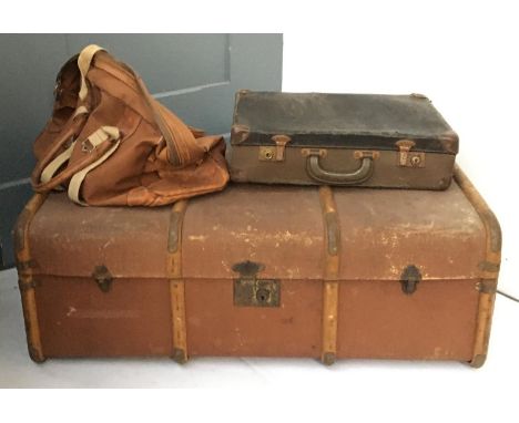 A vintage wood banded travel trunk, 90cm wide; together with a vintage canvas duffel bag and small gent's suitcase (3) 