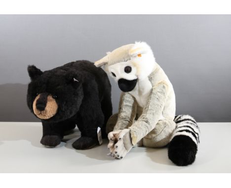 Paar Stofftiere von Steiff"Mr. Big" Schwarzbär (Kopf drehbar) und Lemur "Lommy" (Kopf drehbar, Magnet-Schlenker), L. 62 cm + 