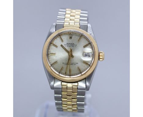 Rolex ArmbanduhrStahl/Gelbgold, „Oyster Perpetual Date“, Automatik, glatte Goldlünette, Twinlock-Krone, erhabenes Glas mit Ve