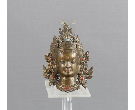 Buddhistische MaskeMessing, Tibet, Abbild der Göttin Tara, L. 19 cm