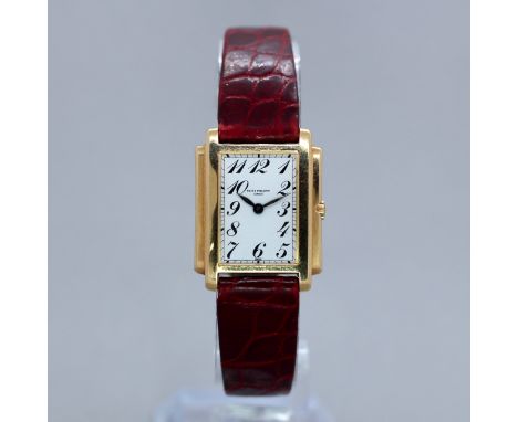 Patek Philippe Damenuhr18 kt Gelbgold, Modell „Gondolo“, Quarz, Kaliber E-15, 6 Steine, weißes Zifferblatt, geschwungene arab