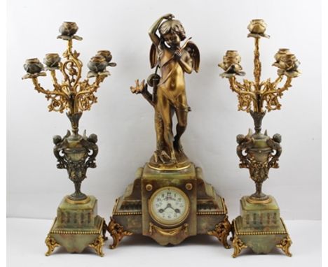 CALIBERT LE HARVRE AN EARLY 20TH CENTURY ONYX AND GILT METAL CLOCK GARNITURE, having centre piece with "Amore Perplesce" stan