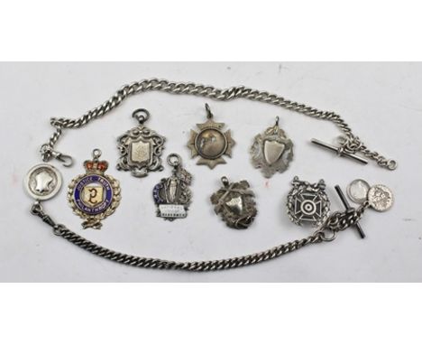 TWO SILVER WATCH CHAINS with T-bars and clips, a Victorian SILVER COIN engraved with the Lord's Prayer, and eight other SILVE