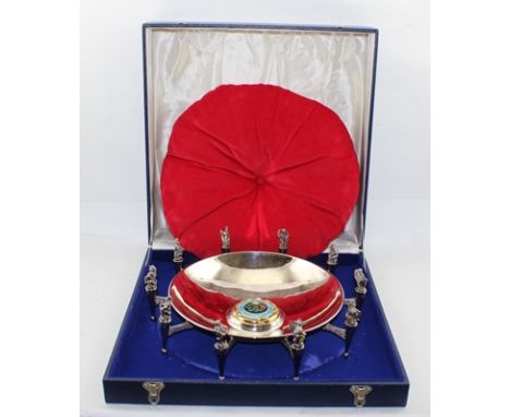 "THE JUBILEE CENTRE PIECE" - A LIMITED EDITION SILVER BOWL, raised upon ten tapering supports, each mounted with a cast silve