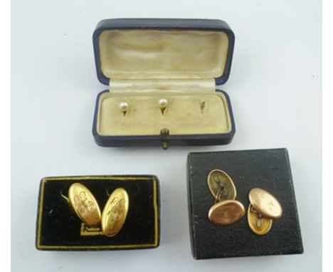 A PAIR OF 9CT GOLD CUFFLINKS of oval form with chain links, engraved monogram "GE", together with one other pair of 9ct gold 