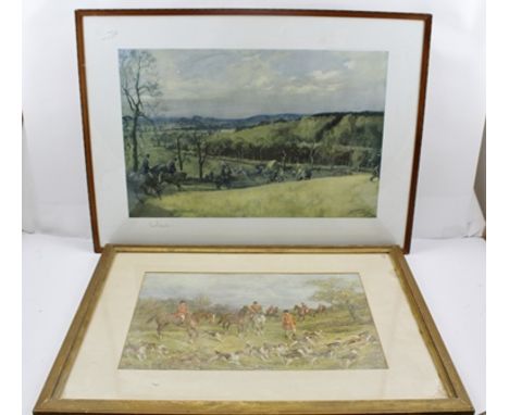 AFTER LIONEL EDWARDS "North Warwickshire Hunt at Skilts" The field take a fence", an extensive hunting scene, a colour Print,