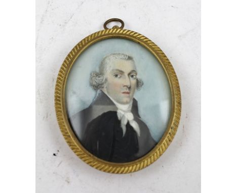 A 19TH CENTURY MINIATURE PORTRAIT PAINTING depicting a head and shoulder image of a gentleman wearing a high collar black jac