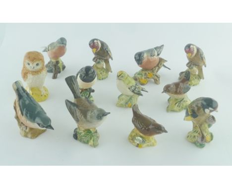 A COLLECTION OF TWELVE BESWICK CERAMIC BIRD FIGURES including; Chaffinch, Gold Finch, Bull Finch, Owl, Stonechat, Wren, Gold 