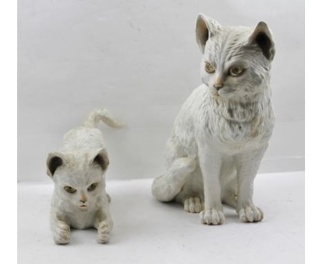 A LATE 19TH CENTURY GERMAN PORCELAIN SEATED CAT, 31.5cm high, together with a playing kitten 