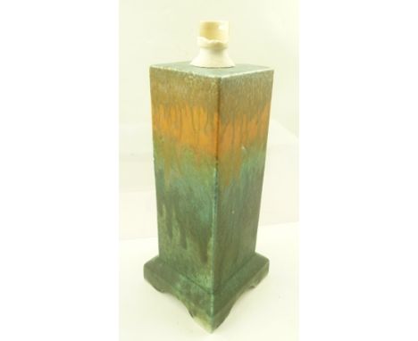 A RUSKIN POTTERY SQUARE FORM CRYSTALLINE GLAZE LAMP BASE, streaked with orange and green, impressed "Ruskin" to base, height 