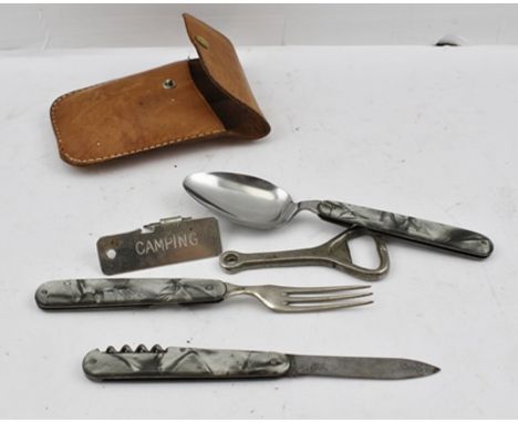 AN ADVENTURER'S EATING SET, comprising folding knife, fork and spoon, with marble effect handles, together with a BOTTLE OPEN