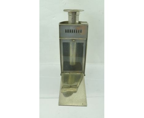 A LATE 19TH/EARLY 20TH CENTURY NICKEL PLATED TRAVELLING CANDLE LANTERN, the hinged lid opening to reveal a fold-out hanging h