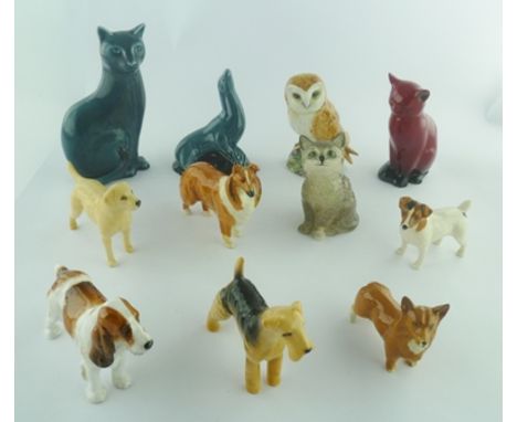 A POOLE POTTERY CERAMIC CAT AND SEAL, together with a ROYAL DOULTON FLAMBE CAT, a ROYAL DOULTON GREY KITTEN, a BESWICK OWL no