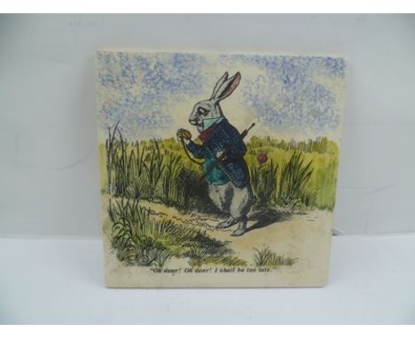 HEREFORD TILES A PICTORIAL TILE from Alice in Wonderland depicting the White Rabbit quoting "Oh dear!, Oh dear!, I shall be t