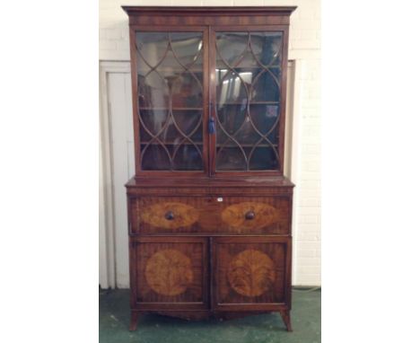 Late C18th/Early C19th Mahogany Secretaire Bookcase on swept bracket supports, pair cupboard doors with circular flame mirror