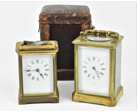 A French brass cased carriage clock with white enamel dial having Roman numerals. Signed 'Cooke &amp; Kelvey, Calcutta' toget