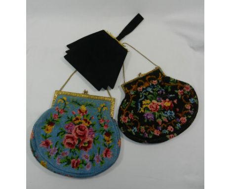 Two tapestry evening bags with gilt metal mounts and a 1950s black suede evening bag, 23cm wide CONDITION REPORT: If you requ