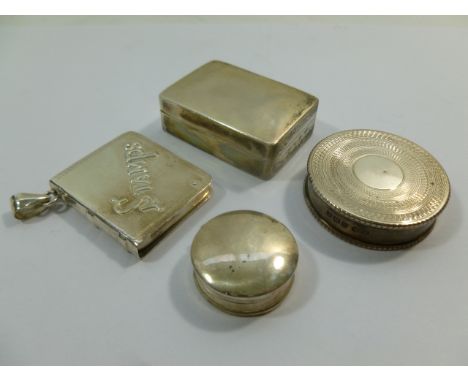 A small Edwardian rectangular silver box and lid with gilt interior, London 1907, 4cm x 2.7cm x 1.3cm high, a circular silver