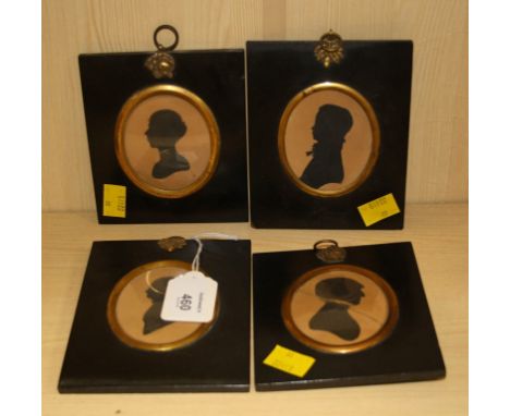 A 19th century cut card portrait silhouette of a gentleman, with label verso 'Cut with Common Scissors' by Master Hubard (age