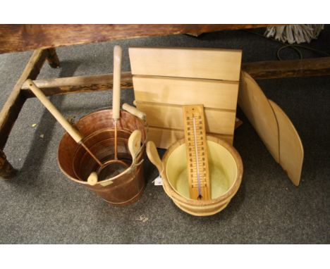 A home sauna thermometer, two benches, sand-filled timer, bucket, brushes and other items