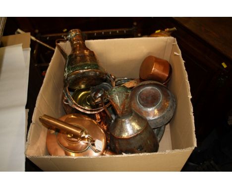 A collection of Middle Eastern beaten copper and other metalwares including ladle, jugs, bowls and pans, together with a Vict
