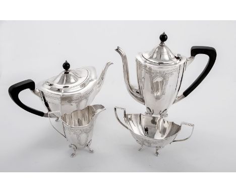 Barker Ellis Silver Co., a silver four piece tea and coffee service of navette panel form, each with engraved winged vacant c