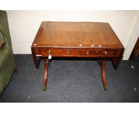 A George IV inlaid mahogany sofa table, two frieze drawers and satinwood strung top, 93cm wide