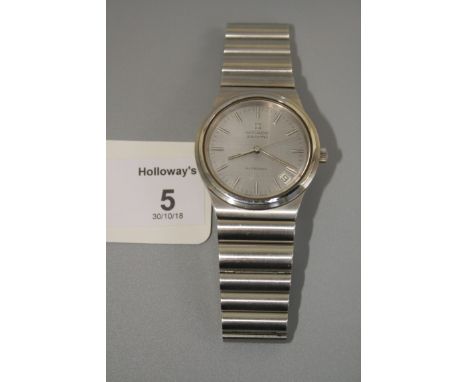 A gentleman's Movado Zenith Xltronic wristwatch, the machined silvered dial with baton numerals, date adjust at four o'clock 