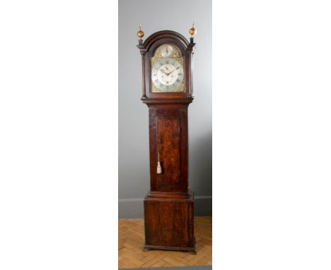 John Hooper, Winton, and early 19th century oak longcase clock, the arched hood with gilt wood ball finials enclosing an eigh