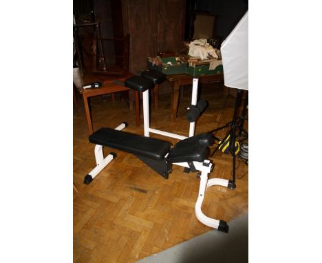 A Tuff Stuff gym bench, and one other exercise bench