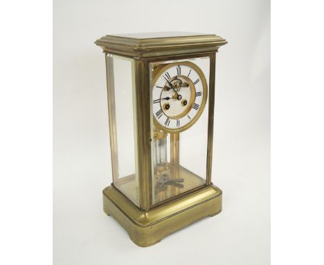 MANTEL CLOCK, late 19th century with four glass and brass case, visible escapement, mercury pendulum, bell striking movement,