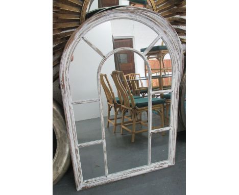 ARCHED MIRRORS, a pair, Architectural style in distressed cream painted finish, 126cm x 86cm. (2)