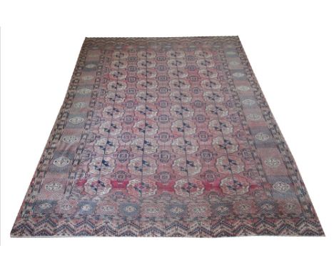 FINE ANTIQUE BOKHARA CARPET, 300cm x 228cm, repeat tribal guls within multiple corrresponding geometric bands and borders.