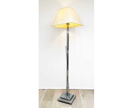 An Art Deco Chrome standard lamp, of square section with angular applied motifs, on a square stepped base, height excluding s