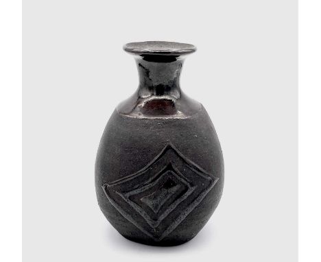 Janet LEACH (1918-1997) A St Ives Pottery bottle vase, the body of slightly square section, tenmoko glaze on matt brown, with