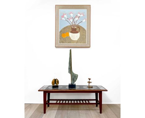 A mid-century teak tile top coffee table, retailed by Heals, the oblong top inset with sixteen Malkin Johnson black glazed ti