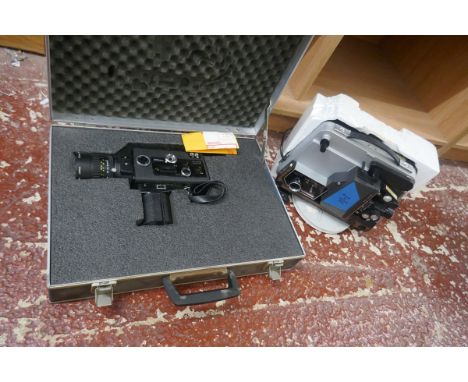 Nikon R10 Super Cine camera in case together with cine projector 