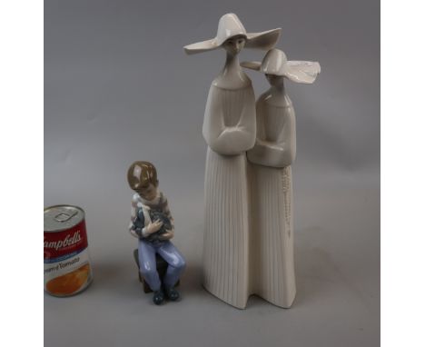 Lladro porcelain figurine of nuns and a Nao seated child 